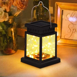 Lanterne solaire LED métal noir verre transparent design vintage portable éclairage extérieur intérieur jardin balcon décoration écoénergétique