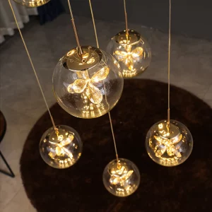 Suspension verre métal doré design moderne éclairage LED élegant luminaire salle à manger salon loft duplex décoration moderne élégante économie d’énergie