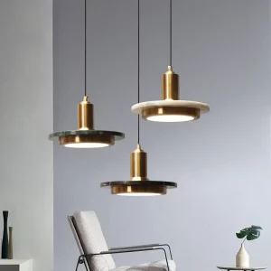 Plafonnier suspendu verre design moderne luminaire décoratif salle à manger hôtel éclairage contemporain marbre métal doré lumière diffuse élégance intemporelle économies d’énergie