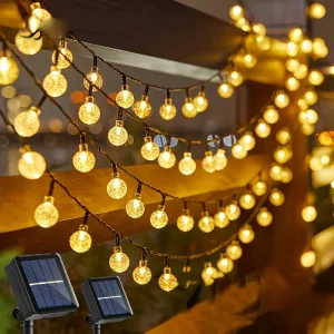 Guirlande solaire LED 100 ampoules globe plastique lumière extérieure IP65 jardin arbre patio fête décor ambiances chaleureuses économiques écologiques Guirlande solaire LED 100 ampoules globe plastique lumière extérieure IP65 jardin arbre patio fête décor ambiances chaleureuses économiques écologiques