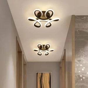 Plafonnier LED moderne design sculptural lumière douce aluminium finition mat salon chambre entrée éclairage intérieur décoration contemporaine