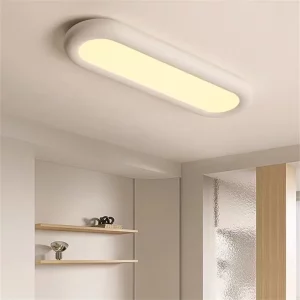 Plafonnier moderne design minimaliste ovalé blanc mat LED éclairage uniforme chambre salon couloir bureau luminosité adaptative économie d’énergie élégance intemporelle