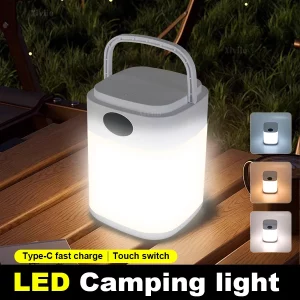 Lampe de camping portable LED rechargeable USB avec télécommande 3 modes  poignée intégrée  design moderne  blanc et gris  éclairage extérieur  randonnée  tente  nocturne économique