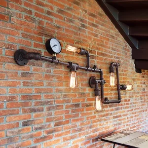 Applique murale industrielle vintage tuyaux métal fer finition rouillée éclairage Edison style loft design unique éclairage chaleureux intérieur déco